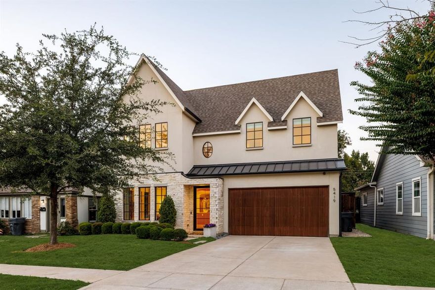 Breathtaking transitional design, custom built by Fairmont Homes in 2018, this residence delivers luxury living at its finest—just steps from the highly anticipated 161,000 SF mixed-use development on Henderson Avenue + the best of Greenville restaurants & shopping. A light-filled, two-story foyer sets the tone, opening to an elegant dining room crowned with a statement chandelier. Thoughtful details abound, including graceful archways with beam accents, museum-finished walls, expansive windows, & pristine white oak hardwoods throughout. The first-floor primary suite is a true retreat, featuring a spa-inspired bath with luxurious finishes & a spacious walk-in closet with a makeup vanity. A private study, tucked away for quiet focus, makes the ideal home office. At the heart of the home, the chef’s kitchen impresses with rift-cut white oak accents, custom inset cabinetry, JennAir professional appliances, & a generous walk-in pantry. A stylish bar connects seamlessly to the family room, designed for effortless entertaining. Indoor and outdoor living blend beautifully as the family room opens to a covered loggia overlooking the backyard retreat. Outside, a sparkling pool with separate spa, tanning ledge, & integrated bench seating offers the perfect balance of relaxation and recreation, all framed by beautifully manicured artificial turf. Upstairs, a large game room anchors four spacious secondary bedrooms, each with an en-suite bath & walk-in closet, ensuring comfort & privacy. Stay effortlessly organized with abundant storage throughout, including built-in mudroom cabinetry, supplemental closets, & ceiling-mounted garage storage. This residence is truly turnkey, complete with custom window treatments—including designer draperies, rods, & Roman shades—plus an integrated AV system with built-in speakers and cameras. Do not miss this exceptional home, ideally situated on one of Lower Greenville’s most desirable blocks, surrounded by high-value new construction.