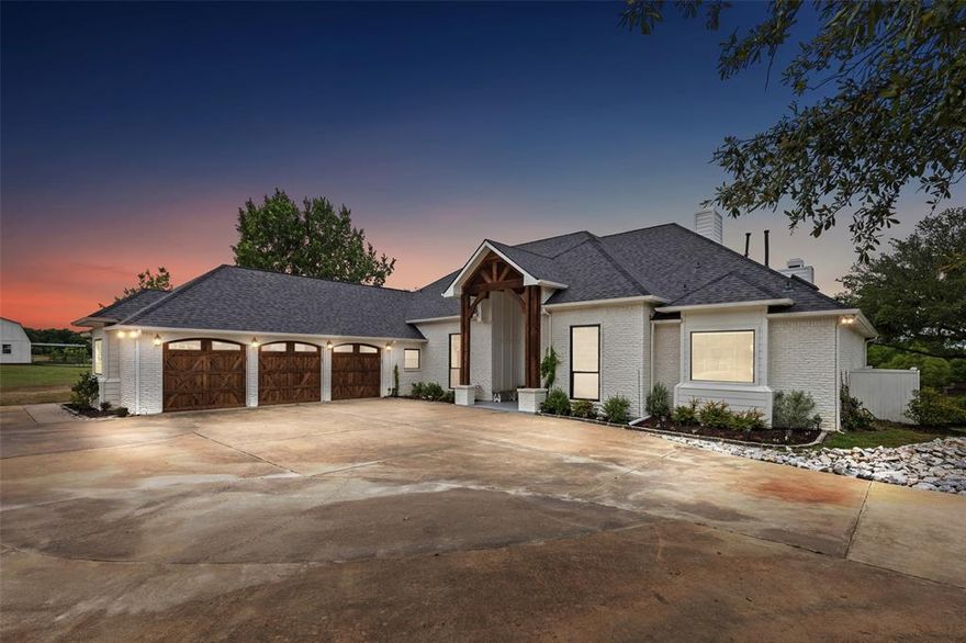 Positioned on a hilltop to capture expansive sunset views, this remodeled (2020) modern farmhouse offers a unique blend of privacy, functionality, and long-term upside. Set on 6.8 acres in an unincorporated area outside city limits, the property benefits from an AG exemption and significantly lower tax exposure - an increasingly rare combination this close to major growth corridors.

The land is thoughtfully improved with a private pond fed by an onsite well, mature trees, and usable acreage suited for a variety of residential or recreational uses. A gated entrance welcomes you to a picturesque setting complete with a windmill, separate office or flex space, raised garden beds, and dedicated areas for seasonal planting.

Located within walking distance to West Grove development, this property sits directly in the path of continued expansion along 380, creating a compelling opportunity for both end users and those considering future positioning.

A hard-to-find combination of location, land, and flexibility—this is one you don’t see often.