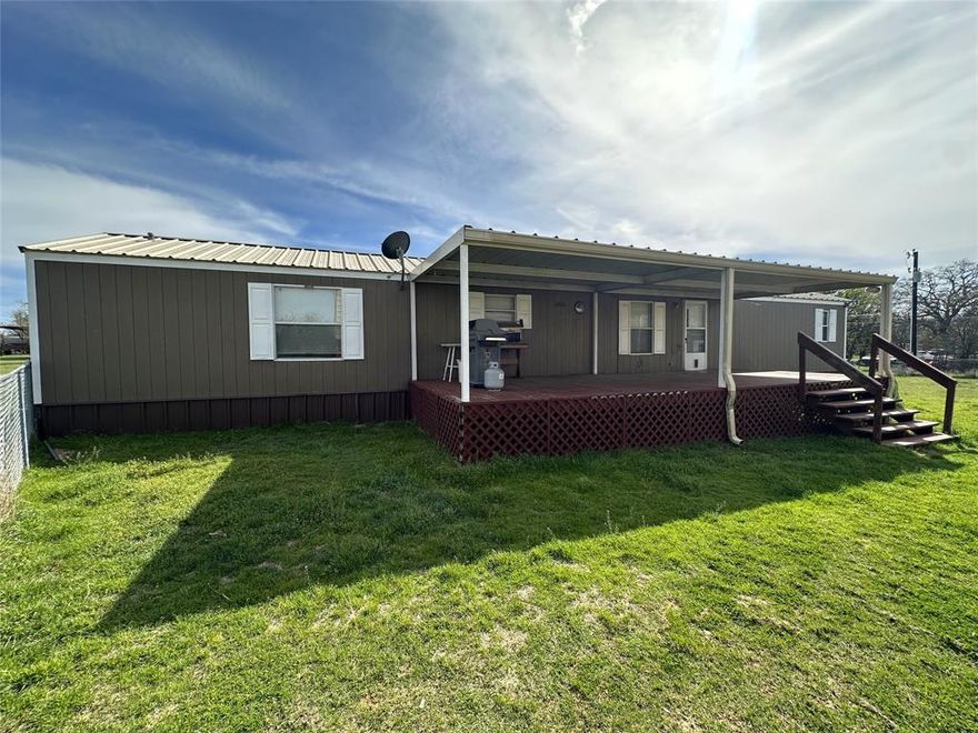 If it's a lake community you seek, this little gem is at the heart of a great little subdivision at Harbor Point, nestled at the edge of beautiful Lake Brownwood. 
Whether you're searching for a full-time home or a weekend getaway, this spacious home offers comfort and practicality. A beautiful porch for entertaining or simply enjoying a tranquil moment with a morning coffee awaits you, and an RV cover with hook-up is installed for the convenience of parking an RV, adding extra space for you or guests. A small shop with electricity and a storage shed also sits on the property, with the addition of another carport to keep your vehicles protected. The 3 geerous sized bedroom s have ample closet space, and the primary bedroom is equipped with an ensuite with a shower and a bathtub for convenience and privacy. Seller is willing to consider some seller concessions for new carpets with the right offer. Washer, dryer, and refrigerator convey. Call the listing agent today to view this charming little lake community home before it's snapped up!