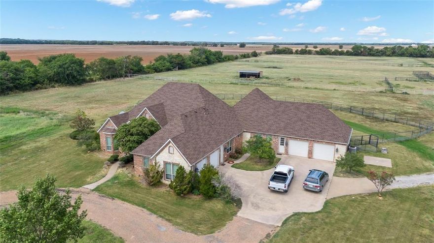 You don’t leave the city for more space—you come here for a different way of living. Set on approximately 15 private acres in Pilot Point, 2300 Berend Road is a private ranch estate where comfort, open land, and long-term potential come together in one of North Texas’ fastest-growing corridors. Surrounded by mature trees, open pasture, and wide Texas sky, the setting offers privacy and space today with future positioning buyers increasingly look for in this market.

Inside, the residence offers four bedrooms, five full baths, and expansive living spaces designed for both quiet daily living and effortless entertaining. Natural light moves easily through the interiors, highlighting generous proportions, inviting finishes, and a layout that balances openness with comfort. At the center of the home, the kitchen serves as both anchor and gathering place—created for function, connection, and everyday living.The primary suite is designed as a private retreat, while each additional bedroom offers privacy and flexibility. Beyond the residence, the property opens into an outdoor setting built for entertaining, recreation, and ranch living. A heated pool with waterfall, slide, tanning ledge, outdoor shower, and dedicated pool bath creates a resort-style setting designed for gathering. The grounds are equally functional, featuring two large pastures, loafing sheds, and a 2,300-square-foot shop for equipment, storage, hobbies, or to potentially host events. 

For buyers considering long-term positioning, the property is located near the proposed Pecan Creek master-planned development and within the path of continued growth surrounding Pilot Point. In a market where land is increasingly purchased for both lifestyle and future upside, this property could offer both.