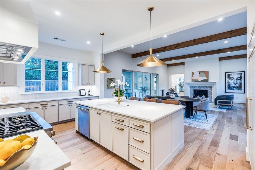 Crafted with care and grounded in thoughtful design, this home earns the word timeless. 
Set quietly in Midway Hollow, on a block where the noise settles and the trees hold steady, this home doesn’t beg for attention—it earns it. You feel it in the proportions, the materials, the restraint. Nothing overdone. Every detail considered. Step inside and the tone is clear: calm, warm, grounded. At the center of the main floor, a gas fireplace shapes the living room as much as it warms it. Around it, the layout flows—dining that invites connection, and a kitchen that balances beauty and function: Monogram appliances, hidden storage, and a walk-in pantry that makes daily living feel effortless. Just behind, a laundry and mudroom lead to an oversized three-car garage—offering added flexibility with space to spare. With a built-in grill, space to gather, and room for a full dining setup, the backyard becomes a true setting. A covered patio offers shade and shelter, with open sky stretching beyond. The primary suite is privately tucked away—offering soft light, generous proportions, and a spa-like bath with separate vanities, a freestanding tub, Taj Mahal stone, and a closet with room to spare. Also on the main level, a front-facing bedroom makes a perfect guest space or home office. Upstairs, the vaulted game and media room becomes a destination. Each additional bedroom has its own en-suite bath for comfort and privacy. It’s not just beautiful—it runs beautifully, too. With high-efficiency systems and smart features, this home is built for everyday ease. Designed by MANA Collected. Built by HGC Development.
It’s where it works. And where it lasts.