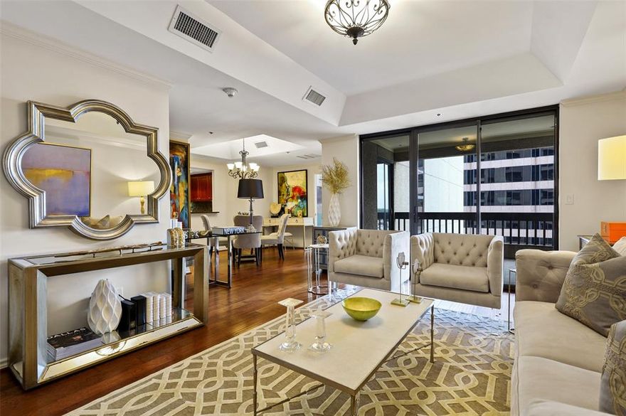 Experience luxury high-rise living in the heart of the Park Cities. This lock-and-leave condo offers access to top-rated Highland Park ISD and an unparalleled amenity package. The well appointed kitchen features stainless steel appliances and a utility room, opening seamlessly to the living and dining areas. A spacious, covered outdoor living area extends the main living room for year-round enjoyment. The ideal floorplan includes bedrooms with spa-like marble baths and generous storage. Upscale amenities include valet parking, 24-7 front desk, a state-of-the-art fitness center, clubroom, pool with cabanas, a putting green, and a large covered outdoor grilling space. Located in premier Preston Center—steps from acclaimed restaurants, retail, and offices. This property comes with 2 assigned parking spaces and a large storage.