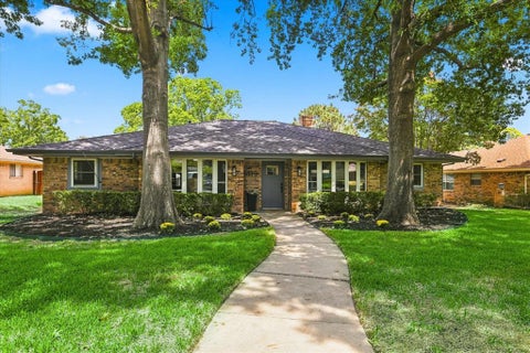 Photo of 1419 San Antone Lane, Lewisville, TX 75077 (MLS # 21370814)