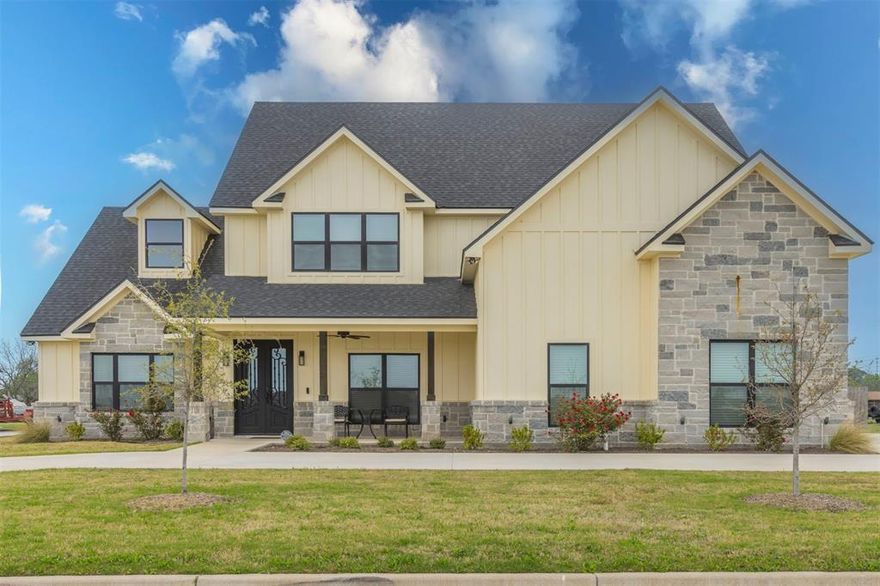 Breathtaking home in prime location. Welcome to modern farmhouse elegance in the beautiful Waters Edge development. This designer dream home blends style, comfort, and function, perfect for families, entertaining, or simply enjoying everyday luxury. This stunning 3,000 plus square foot residence offers ample space and comfort with its four generously sized bedrooms and three designer bathrooms, making it perfect for families and those who love to entertain. The property's open concept design enhances the flow between the living spaces, creating a welcoming atmosphere for gatherings large and small. The private owner’s suite offers a true retreat, boasting soaring ceilings and a luxurious bathroom with a spacious walk in shower and freestanding soaking tub. Step into the open-concept living room, where soaring ceilings, a striking tiled fireplace, sleek modern stair railing, and floods of natural light create a space that’s both impressive and inviting. Start your day with a relaxed breakfast at the spacious kitchen island, or gather for meals in the light-filled dining room just steps away from the kitchen. The luxurious pantry offers plenty of storage for all your appliances, The large mudroom and laundry room has a washing basin which is perfect for cleaning up after outdoor fun. Upstairs, there are three spacious bedrooms and a large guest bathroom with dual vanities on opposite sides of the room and a separate shower and toilet area. The landing area offers ample space for a seating nook or study area. The large walk in attic is ideal for a home office, studio, or additional storage. The oversized 2 car garage with built in cabinetry and an AC is spacious to include a home gym or workshop. Step outside to enjoy a generous backyard ideal for grilling, entertaining, or adding a pool or pickleball court. Don’t miss this rare opportunity to own a standout home in one of the most desirable neighborhoods in town. Come see it for yourself before it’s gone.