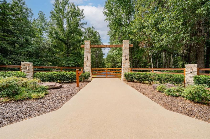 Beautiful East Texas Farm and Ranch Property. Minutes from Lake Cypress Springs Welcome to this stunning 124 acre farm and ranch retreat nestled in the heart of East Texas, just minutes from the crystal-clear waters of Lake Cypress Springs and approximately 1 hour and 45 minutes from Dallas. This rare property offers a perfect mix of open pasture and mature woods, creating an ideal setting for small livestock, recreation, or peaceful country living. The land features a spring fed pond and an impressive 7-acre lake, both adding to the natural beauty and providing endless opportunities for fishing and wildlife watching. Nature trails weave through the property, making it perfect for hiking, riding, or quiet reflection among the trees. (Note-the dam needs to be repaired) Improvements include a 30x40 metal building with an attached 30x20 open shed, plus two freestanding carports for additional covered parking or equipment storage. A heated greenhouse allows for year-round gardening, while the 4-car garage and workshop combo offers plenty of space for tools, hobbies, or farm equipment. The comfortable 3-bedroom, 2 bath home offers approximately 1,680 square feet of living space, including a dedicated office area, ideal for those working remotely or managing property operations from home. A security gate provides privacy and a sense of seclusion, yet you're still within easy reach of Lake Cypress Springs, Lake Bob Sandlin, and the charming nearby towns of Mount Vernon, Winnsboro, and Pittsburg.