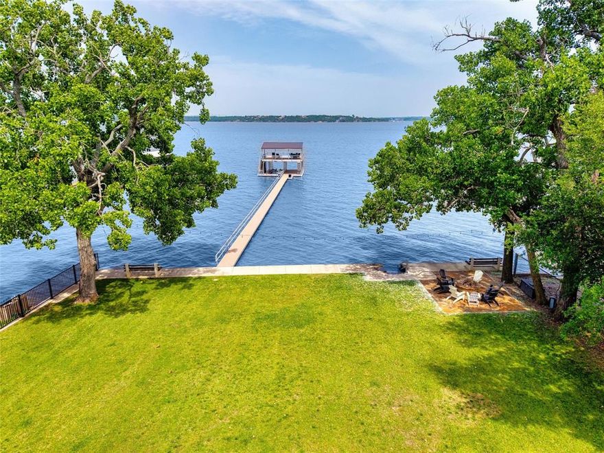 Come play now, build later, and fall in love with lake life every single day at Eagle Mountain Lake.

This 1.1-acre premier lakefront lot isn’t just a place to build—it’s your front-row seat to wide-open water, breathtaking sunrises, and endless weekends on the lake. With 100 feet of prime main-body frontage, you’ll enjoy big water views, cool breezes, and instant access to boating, fishing, and swimming right from your backyard.

The fun starts the moment you arrive—no waiting required. With over $700K in improvements already in place, this property is fully set up for lake days and sunset nights:

Two-story boathouse & dock (approx. 30x30) ready for all your toys
Concrete retaining wall & lakeside sidewalk
Firepit lounge area perfect for stories, s’mores, and starry nights
Lake-fed sprinkler system to keep everything green and gorgeous
Landscaped, fenced, and gated for privacy

Bring your friends, tie up the boat, cast a line, and soak in the good life while you design and build your dream lake home at your own pace.

Want even more space or a multi-generational setup? The neighboring home at 218 N Broadway is also available (MLS 21174793), creating a rare chance to own a larger slice of this incredible shoreline.

You’re just a quick boat ride from the renowned Fort Worth Boat Club and under 30 minutes to downtown Fort Worth—making it easy to balance peaceful lake living with city convenience.

Build your dream. Live the lifestyle. Start making lake memories now.
