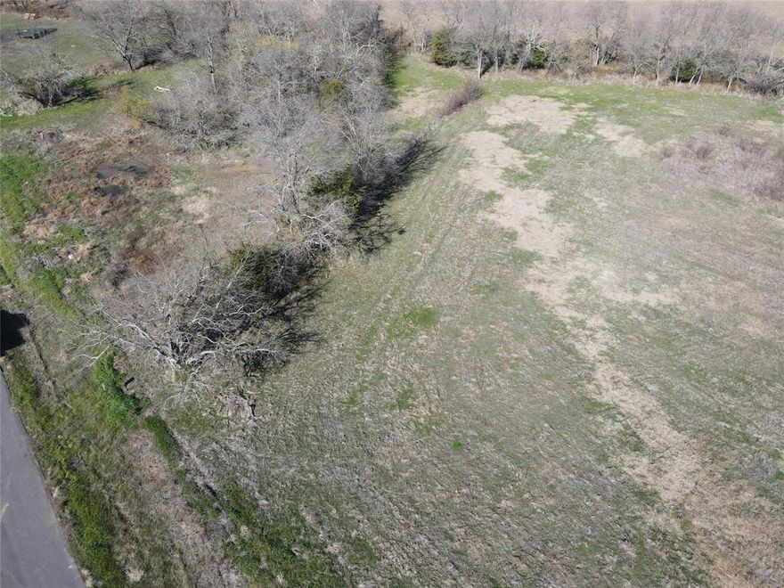 Nestled in North Texas, Rolling Acres offers beautiful 1-3 acre tracts with diverse trees and natural grasses. The subdivision features freshly paved 28-foot-wide roads and spacious lots just off the county road. It's conveniently located only an 8-minute drive from downtown Greenville and 10 minutes from various shopping and dining options. With easy access to I30, commuting to Dallas County takes just 45 minutes. Whether you're looking to build your dream home or place a manufactured home outside the city limits, Rolling Acres provides an ideal setting of tranquility and convenience.