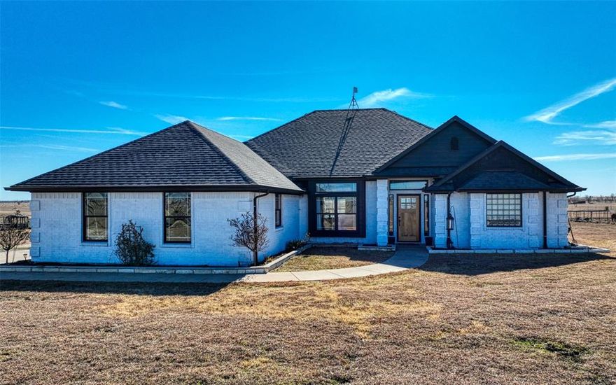 Enjoy country living at its finest! This beautiful, open concept 3 bedroom, with a large bonus room that could be a 4th, 2 bath, 3 car garage home sits on 10.1 acres and has it all! Some of the many upgrades include recent roof, new AC unit, double gated entrance, fresh paint on interior and exterior, rock driveway, new garage door openers, leathered granite countertops and luxury vinyl flooring throughout. Also featured are updated baths with claw foot tub and walk in shower in the primary, his and her closets, double vanities, updated lighting and so much more. Barn, chicken coop, loafing shed and cross fencing make this property the perfect place for the animals too! A short drive to I-45, Buc-ees, restaurants, shopping and everything that Ennis has to offer. Truly a MUST SEE!