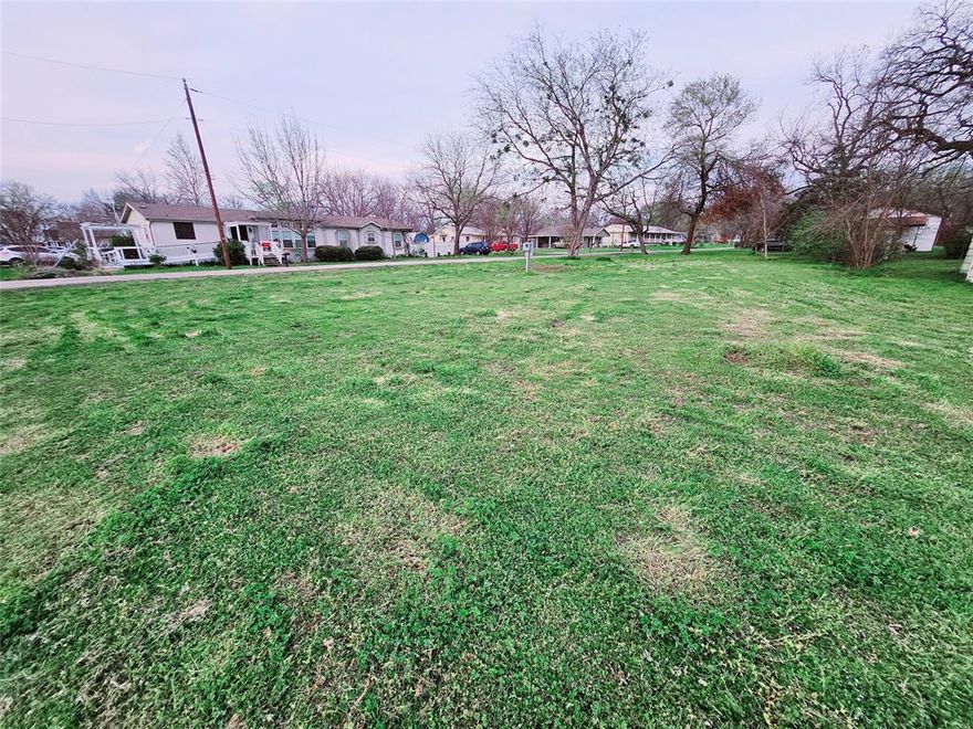 Come build your dream home in the heart of Quinlan! Fantastic location, walking distance to the cute shops on Main Street and several of the schools in town. Owner Financing Available! 
All information is approximate and to be verified by the buyer and buyer's agent.