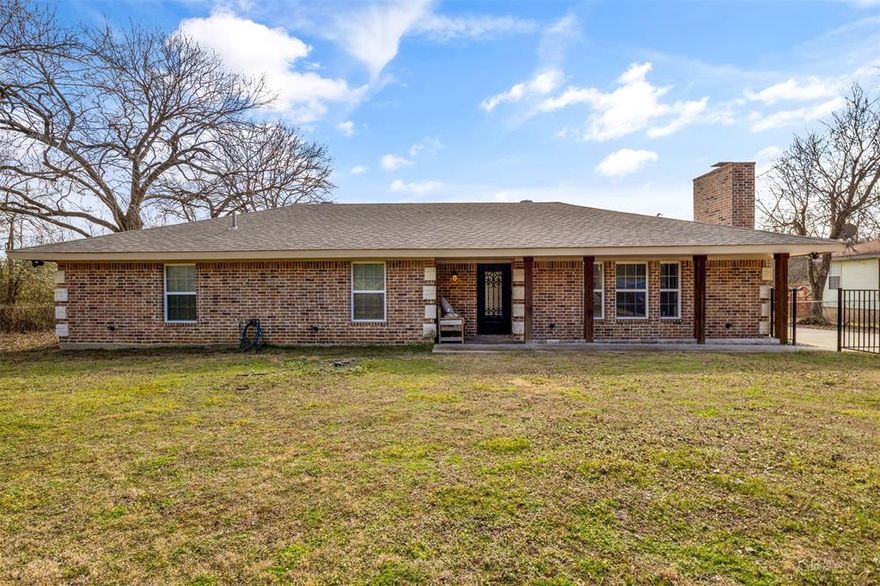 Come see this beautiful move-in ready Cedar Hill home! Sitting less than 5 miles from downtown Cedar Hill, this home is perched on a 1+ acre lot creating a perfect escape from all the hustle and bustle while still being in idea proximity to all your necessities. Access 67 or 35E within minutes. Head indoors where you will find a bright & open living area with a wood burning fireplace, raised ceilings, and great natural lighting. Your new chic kitchen overlooks the living and dining space featuring a large island, granite counters, and all stainless appliances. The primary bedrooms is tucked away at the end of the hall boasting views into the private backyard and a stunning en-suite bath with a dual vanity, large soaking tub, walk-in shower, and over-sized walk-in closet! The two additional bedrooms create plenty of flexible arrangement options to suit all of your needs! Outback you have a fully fenced yard complete with deck and tons of room to make this space your own! Don't miss out on this incredible opportunity to own a home on over an acre just 5 miles from Cedar Hill!