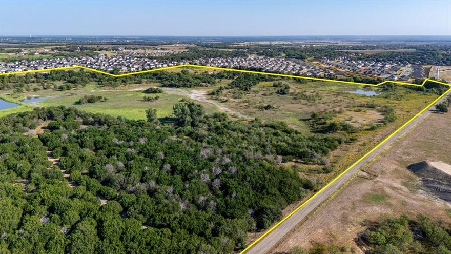 Located in the highly desirable China Spring area, this ±87.05-acre tract presents an exceptional opportunity for residential development, personal use, or long-term investment. Surrounded by the natural beauty and community feel that define the region, the property offers ample space and flexibility for those looking to build, develop, or hold land in one of Central Texas’s most steadily growing markets.

Zoned R-1B (Single Family Residence) within the City of Waco, the property provides flexibility for new neighborhood development, family estates, or long-term land investment. With approximately 2,050 feet of frontage along Arnett Lane and access to city water, sewer, and electricity, the site is primed for future growth and immediate potential.

Its location offers the best of both worlds—close to China Spring schools, Waco Regional Airport, and area amenities, yet surrounded by the open space and natural beauty that give the area its small-town character. Whether envisioned as a master-planned community, private ranch estate, or strategic hold for future development, this tract combines location, infrastructure, and lasting value in a growing market.