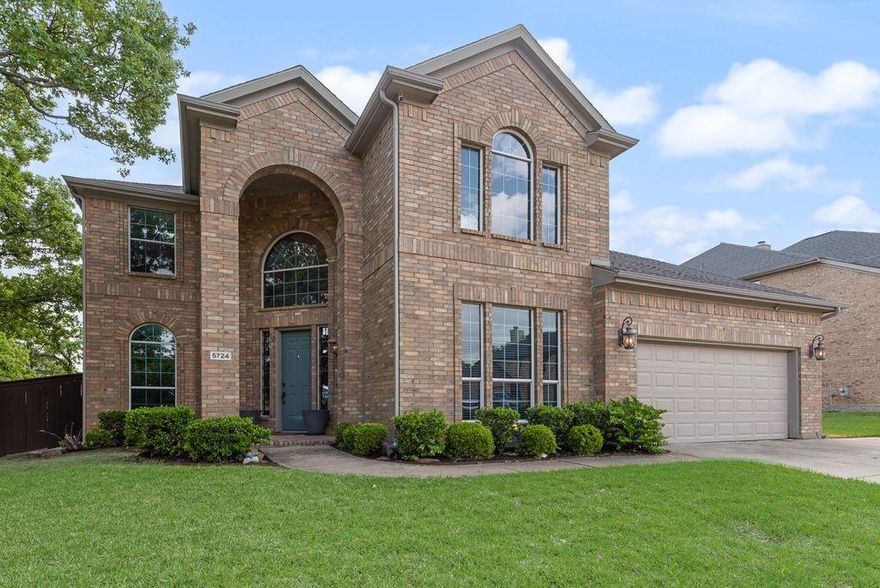 Perfectly situated on an oversized lot in the highly sought-after Villages of Woodland Springs, this beautiful home blends functionality with extensive updates throughout. The downstairs features an open-concept layout with a large, fully updated eat-in kitchen showcasing impeccable finishes. Highlights include granite countertops, abundant cabinetry, a spacious island, newer stainless steel appliances, and updated fixtures. The spacious primary suite offers a sitting area, direct access to the pool, and a spa-like ensuite with a large frameless shower and an elegant standalone tub. Also on the main level are a private office with vaulted ceilings and a formal dining area. Upstairs, you’ll find a large living space or game room with direct access to a media room, separated by barn doors and equipped with surround sound. The split layout includes three oversized bedrooms and two full bathrooms. The outdoor living space completes this exceptional home, featuring a sparkling pool with a waterfall (2017), an extended patio, an 8-foot privacy fence, a storage shed, and plenty of yard space. The community offers fantastic amenities and is located within the top-rated Keller ISD, with convenient access to shopping and major highways.