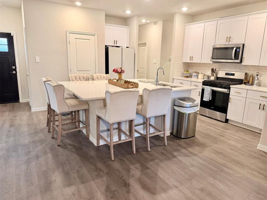 Welcome to 4010 Murvaul, a beautifully designed 3-bedroom, 2-bathroom home nestled in the sought-after Lakehaven community of Farmersville, Texas. This charming residence features an inviting open-concept layout with a split-bedroom design, perfect for both privacy and togetherness.  Step inside to a welcoming living space filled with natural light, seamlessly flowing into the modern kitchen equipped with a gas cooktop, plenty of counter space, and a large island ideal for entertaining. The primary suite offers a peaceful retreat with a spacious ensuite bath and generous walk-in closet.  Enjoy outdoor living in a thriving master-planned neighborhood offering an impressive array of amenities — including a community pool, clubhouse, tennis courts, basketball courts, and scenic walking trails. Lakehaven is known for its strong sense of community, top-rated schools, and easy access to major highways connecting to employment centers in McKinney, Allen, Princeton, and beyond.  Located just minutes from charming Downtown Farmersville with local shops, dining, and parks, this home blends small-town warmth with modern convenience. Whether you're relaxing at home or exploring all that the Lakehaven neighborhood has to offer, 4010 Murvaul is the perfect place to call home.