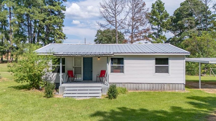 Charming 3-bedroom, 2-bath home with a versatile bonus room in back! Though a mobile home by designation, it was constructed with the feel and quality of a site-built house—featuring upgraded walls, durable flooring, and a sturdy metal roof for peace of mind.

Step inside to an inviting open-concept layout that creates a warm and comfortable flow throughout the living, dining, and kitchen areas. The welcoming front porch is perfect for morning coffee or winding down in the evenings, while the bonus room in back provides endless options—use it as an extra bedroom, a second living area, or even a home office.

Nestled in a quiet area with an asphalt driveway and convenient frontage on a Farm-to-Market road- no potholes here! This property blends easy living with practical upgrades.