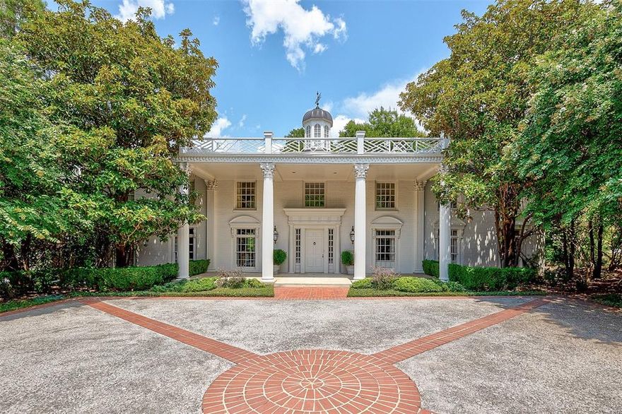 Situated in the heart of Westover Hills, this gem exudes old-world charm and sophistication. Once owned by renowned interior designer Joseph Minton, the home features many of his exquisite details, such as a cupola, a lowered living room floor, beautiful scraped hardwoods, elaborate moldings, and the finest hardware. The dining room-library is perfect for entertaining. The current owner added a bedroom and bath off the living room, which can serve as a primary suite with a sitting room overlooking the treetops. The original primary suite is upstairs, complete with a bath and dressing room. Additionally, there is an upstairs guest bedroom and bath, along with a cozy sitting room with a fireplace. A beautiful private terrace overlooks the 1.7-acre property, making this home a hidden gem for the most sophisticated buyers.