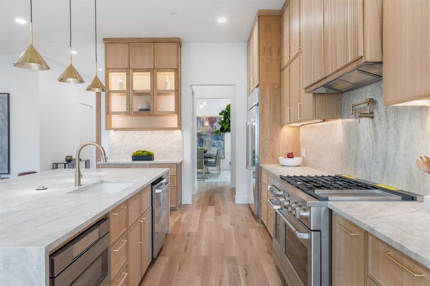 Experience a seamless blend of traditional elegance and contemporary sophistication. The open concept layout provides a warm and inviting atmosphere, perfect for both family living and entertaining guests. The heart of the home is undoubtedly the state of the art designer kitchen. Equipped with top-of-the-line appliances, custom cabinetry, and an expansive island, this kitchen is a culinary enthusiast’s paradise. High-end finishes, such as granite countertops, elevate the aesthetic while ensuring functionality. With 4 generously sized bedrooms, this home provides ample space for relaxation and privacy. The bathrooms are designed with high-end fixtures and finishes, creating a spa-like retreat. Enjoy relaxing soaks in the freestanding tub or refreshing showers in the beautifully tiled walk-in showers.