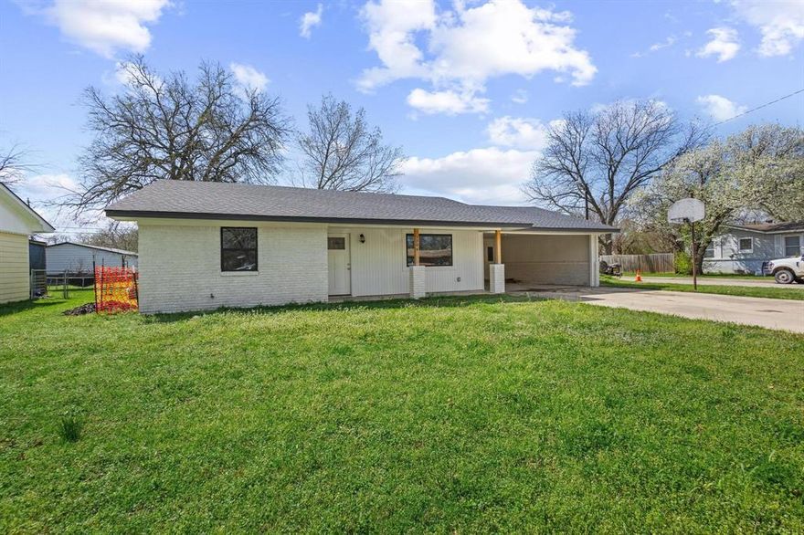 This fully remodeled 2 bedroom, 1 bath home in Gainesville, Texas offers 1,117 square feet of updated living space and sits on a spacious corner lot. Approaching the property, you'll notice the inviting curb appeal highlighted by a brand new roof, new energy efficient windows and fresh exterior paint. 
This home has been rebuilt from the studs up with major upgrades including a new electrical system, modern plumbing, new HVAC system and premium insulation designed for long term comfort and efficiency. Entering the home, you're welcome by an open floor plan with luxury vinyl plank flooring that connects the living, kitchen and dining areas. The kitchen provides granite countertops, ample cabinet storage, and an island with granite top that provides additional workspace and seating. Stepping outside , you'll find a fully fenced backyard alone with a covered patio ideal for relaxing or entertaining. Conveniently located close to shopping, dining and everyday amenities, this home offers modern updates and comfortable living in the heat of Gainesville. Transferrable warranties available.