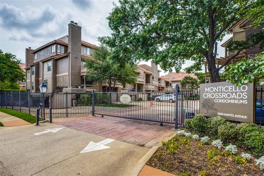 FIRST LEVEL, ONE STORY CORNER unit with TWO PARKING SPACES! Welcome to this M-Street, beautifully updated 2 bedroom, 2 bath condo in a gated community, perfectly situated just steps from Glencoe Park. Enjoy morning walks, scenic views, and the tranquility of green space right outside your door. Inside, you'll find a bright and open layout with modern finishes throughout. The spacious living area with a wood burning fireplace flows seamlessly into the dining space and updated kitchen featuring granite countertops, stainless steel appliances, and ample cabinet storage. Both bedrooms offer generous closet space, and the primary suite includes a private, renovated bath. Additional highlights include in-unit full size washer and dryer, updated flooring, and a private balcony - ideal for relaxing or entertaining. Conveniently located near SMU, downtown Dallas, shops, dining, and commuter routes, this turnkey condo offers the best of low-maintenance living in a prime location. AC replaced 2022. Pool and clubhouse onsite.