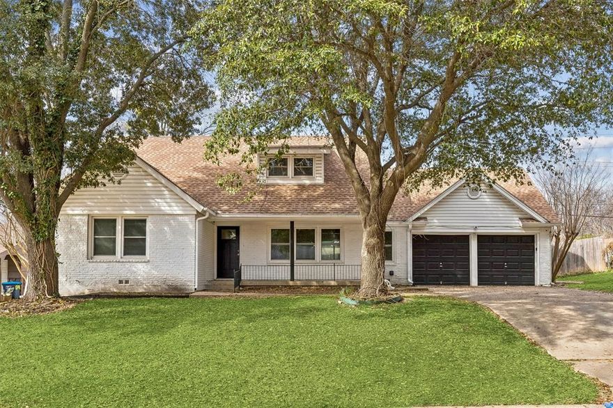 Welcome home to this charming white brick five-bedroom retreat in Western Hills, where timeless character meets thoughtful modern updates and everyday comfort. An inviting, elongated front porch, perfect for rocking chairs, morning coffee, and quiet evenings, overlooks mature shade trees and sets the tone for the warmth you’ll feel inside. A convenient front-facing two-car garage adds to the home’s effortless livability. Step through the door into a light-filled living room that truly sparkles, featuring rich hardwood floors, fresh neutral paint, and an airy, welcoming ambiance. Natural light flows beautifully throughout, creating a bright and uplifting atmosphere in every space. The oversized dining room is made for gathering, whether hosting holiday celebrations or casual dinners with friends and offers sliding doors that open seamlessly to the backyard patio for easy indoor-outdoor entertaining. Just beyond, the stunning kitchen serves as the heart of the home, showcasing stone countertops, a designer backsplash, vent hood, crisp white cabinetry, farmhouse sink, and a generous breakfast bar that invites conversation over morning coffee or evening meals. The thoughtful layout provides three bedrooms on the main level, including a peaceful primary retreat. The fully renovated en-suite bath offers a spa-like experience with a modern vessel sink, framed mirror, and sleek glass-enclosed shower, a serene space to unwind at the end of the day. Upstairs, you’ll discover a flexible private suite ideal for guests or multi-generational living, complete with its own bedroom, full bath, and spacious game room that could easily serve as a fifth bedroom, media room, or home office. Step outside and fall in love with your very own backyard oasis. A large covered patio overlooks the sparkling pool and spa, creating the perfect setting for relaxing evenings, weekend barbecues, and memorable summer gatherings.