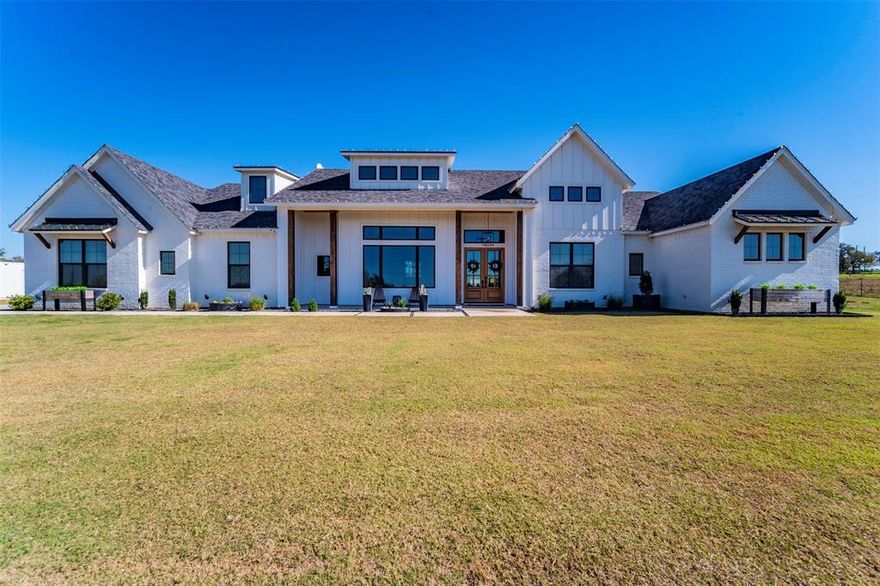 Custom home built in 2021 on 5 acres. Modern Farmhouse style with open concept and neutral finishes. Including hardwood floors throughout, large entertaining area, custom wine room, large walk in pantry, oversized back porch protected from the north wind for year-round use, with gas fireplace, sink and grill. 4th bedroom that can be office or playroom. Auto mower for primary yard, exterior home audio system, Brazos River is 5 miles to the south for your fishing,wake surfing activities, animals welcome, dirt bike track can be left in place or leveled out. Spay foam encapsulation, this home is located outside the city limits, is not in an HOA and has a well. Concrete driveway. Unekoor golf simulator and storage container are negotiable, but are not included in the current listed price. Rare find in Parker County with easy access to I 20 and Weatherford. Buyer agents are welcome.