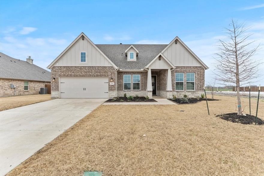 Discover your dream home offering 4 bright bedrooms, 3 well appointed baths, and a convenient 2 car garage. Step inside an inspiring open split-concept design featuring a versatile study adorned with double doors. The elegant entrance, highlighted by an oversized front door, welcomes you into main areas graced with chic wood tile flooring. The heart of the home is a gourmet kitchen complete with an oversized island and generous walk-in pantry. Adjacent, the expansive living room centers around a warm wood-burning fireplace. Secondary bedrooms are generously sized alongside two additional bathrooms, ensuring comfort for all. Retreat to the primary suite, an idyllic oasis with dual sinks, a relaxing garden tub, and a separate shower. Outside, enjoy a covered back patio and a fully irrigated, spacious yard offering serene privacy with no rear neighbors.