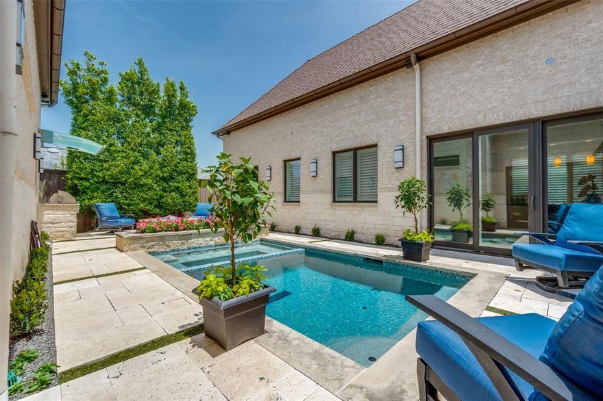 Exceptional transitional set on a corner lot in the highly sought-after, guarded, and gated community of Lake Forest. Open floor plan with an abundance of natural light, high ceilings, stunning entry chandelier, and sliding glass doors from multiple access points to the outdoor living area and pool. Quality craftsmanship, impeccable design and attention to detail are evident throughout the property. Gourmet kitchen complete with Wolf and Subzero appliances is open to the living room with a wall of built-ins and stacked stone fireplace. First-floor primary luxurious suite includes fireplace, spa bathroom, and an expansive custom closet all with transom windows. Two main level offices with built ins provide great flex space. Elevator access to 2 ensuite bedrooms and a game-media or exercise room upstairs. Upgraded designer features and finishes throughout this gorgeous home. Private backyard with ozone cocktail pool and spa, built-in grill, and fire-pit make your time outdoors feel like you are living your best life. Energy Star certified, whole house Kohler generator installed in October of 2024, Rinnai tankless water heaters, air filtration system, and spray foam insulation. Life at Lake Forest features 170 acres of green space with lakes, winding creeks, walking trails, pool, tennis and pickleball courts, and two dog parks. Incredible location for restaurants, shopping and travel around DFW.