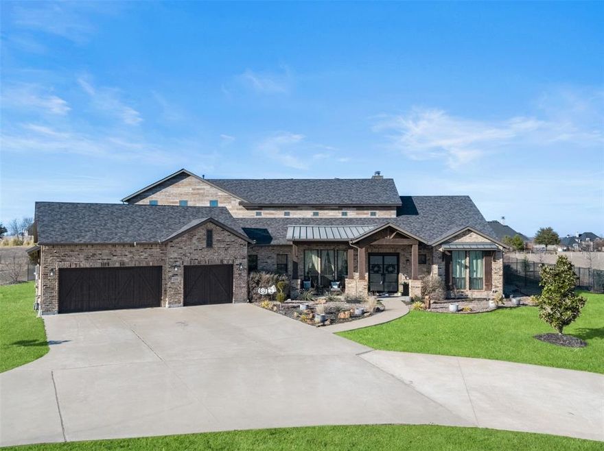 Ready for Farmhouse elegance on 2 acres in Celina with highly ranked Celina ISD?  So many amenities to fall in love with like a play pool with running fountains, a Koi pond for tranquility, basketball sport court to get your fitness in with friends and family.  Check out the massive rear covered patio framed by sliding doors to the inside.  Inside beauty and craftsmanship meet with quality finishes like coffered wood inlay ceilings, vaulted ceilings, sliding barn doors, pocket doors, along with wood beam and ship lap accents.  Bring your inner iron chef to this spacious kitchen.  Professional grade appliances, huge island, decorative vent a hood, pot filler and gas cooktop are just some of the kitchens fine offerings.   The master bathroom will delight all the senses with a designer touches like a free standing tub, gorgeous tile work and lots of vanity space and storage.  An impressive floor plan features a gameroom and media on the first floor just off the kitchen for ease of use to make entertaining a snap.  Natural light floods the space from all the windows which feature spectacular views of your backyard paradise.  The upstairs features a gameroom, 2 bathrooms and 4 sleeping spaces.  Plenty of space up there for all your families needs.  Foundation Poured with 20 Piers Installed! All future roads map and CCR's in MLS docs.  New roof April 2025.  Come and see this elegant home today!
