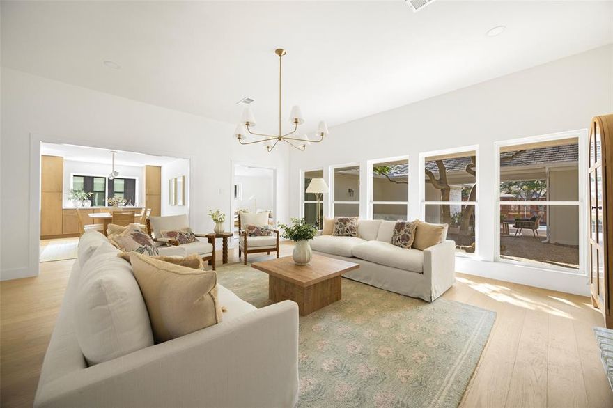 Gracefully positioned within one of Lake Highlands’ most established and welcoming enclaves and zoned to highly regarded Moss Haven Elementary, 9210 Windy Crest is a thoughtfully renovated home that blends timeless design with effortless, turnkey living.

Designed for the way people truly live, the floor plan offers both flexibility and flow. Two distinct living areas create space to gather, work, or unwind, while expansive windows draw in natural light and create a quiet connection to the outdoors. The home’s layout centers around the backyard, with four bedrooms — including one currently styled as an office — and three full baths arranged to capture views of the patio and pool from many of the main living spaces.

Completed in 2025 by Maverick Design and Wedgewood Homes, the renovation reflects a cohesive, design-forward approach. At the center of the home, the kitchen anchors daily life and entertaining with light cabinetry, a bespoke vent hood, and a 6-burner gas range. The adjacent dining space is equally suited for everyday meals or larger gatherings, complemented by a built-in buffet that adds both function and architectural presence.

The primary suite offers a more private retreat, with a reading nook, a spa-inspired bath, and direct access to the patio — an easy extension of the home for morning coffee or quiet evenings.

Living spaces transition naturally outdoors to a covered patio and private pool, creating a seamless indoor–outdoor lifestyle that feels both relaxed and intentional.

Beyond the visible design, meaningful system improvements support long-term livability, including PVC plumbing replacement, a new HVAC system, an updated security system, and a new pool heater.

Natural light. A layout that lives well. A location that continues to hold value.

A home that feels easy from the moment you walk in.