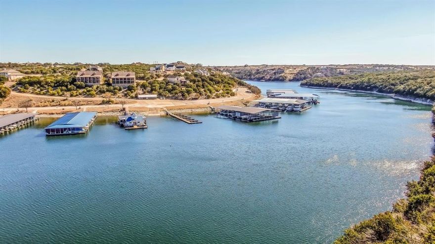 This Beautiful Property is ready for you to build your dream home or private lake house Discover the ideal spot for your custom lakefront retreat at Possum Kingdom Lake! This stunning property in the well-established Gaines Bend community offers everything you need for the perfect getaway. Imagine a custom-built home with space for a pool, ample storage, and breathtaking lake views from a potential second story. Enjoy access to a community boat dock, sandy beach fronts, and spectacular cliff views, including the iconic Hell’s Gate—a favorite spot for lake lovers. The natural surroundings add to the property’s charm, with abundant wildlife like deer enhancing the serene, rustic atmosphere. Whether it’s boating, fishing, or simply relaxing, this property has it all, blending luxury and outdoor adventure. Plus, it qualifies through the Veterans Land Board. Own a piece of paradise! Adjacent lot also available to give a double lot as an option.