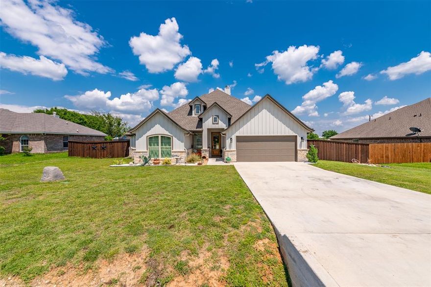 Welcome to your dream home! This stunning 4-bed, 2-bath gem in Aledo ISD blends modern elegance with comfort. The open-concept layout connects the spacious living room, dining area, and chef's kitchen with sleek countertops, stainless steel appliances, and ample cabinet space. Bedrooms provide personal retreats, while the primary suite features a walk-in closet and luxurious ensuite with a soaking tub and dual sinks. Enjoy energy efficiency year-round with spray foam insulation. Plus, the seller offers a $5000 allowance (with full price offer) for a loan buy-down. Outside, a covered patio and spacious backyard await. Don't miss this opportunity!