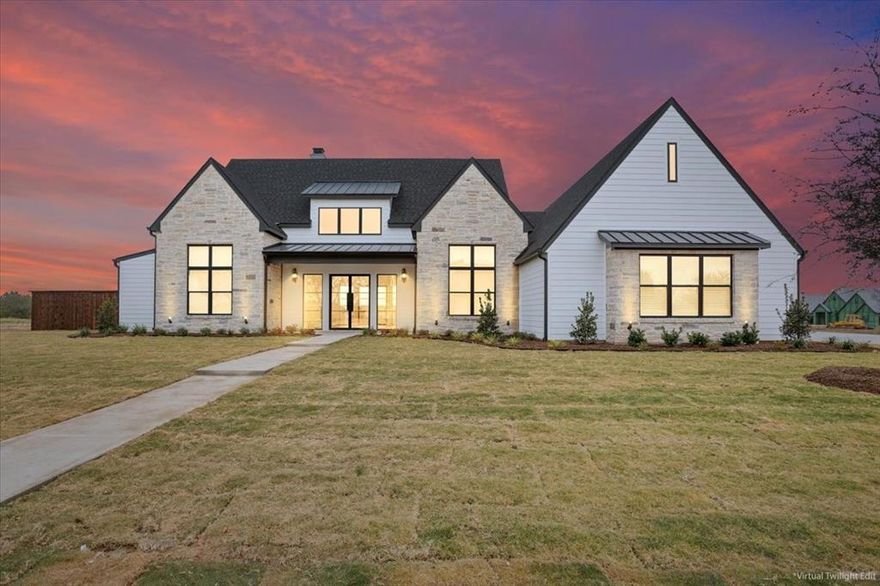 Welcome to 919 Fawn, a stunning new build by Chad Boen Homes, where craftsmanship, design, and comfort meet in perfect harmony. This four-bedroom, 3.5-bath luxury residence features an open-concept layout with soaring cathedral ceilings and extraordinary natural light streaming through custom black iron doors at the front entry and back porch. At the heart of the home is the chef’s kitchen, offering generous workspace with white oak cabinetry, luxury GE appliances, and propane gas for both the range and the living room fireplace. The oversized walk-in pantry provides exceptional storage for dry goods and small appliances—keeping countertops beautifully clutter-free. Adjacent to the kitchen, the breakfast nook is surrounded by tall windows, welcoming in soft morning light and creating the perfect space for casual dining. The living room is a true showstopper—its vaulted ceiling and open design create an inviting, airy space ideal for entertaining, complete with a charming gas fireplace for cozy evenings. The isolated primary suite is a retreat, featuring a spa-like bath with a freestanding tub, oversized walk-in shower, dual vanities, and a massive walk-in closet. Bedrooms two and three share a convenient Jack-and-Jill bath, each with its own vanity and walk-in closet, while bedroom four offers a private en-suite bath and closet—perfect for guests. A half bath is easily accessible off the main living area. The home also includes a large utility room with cabinetry, counter space, and a built-in sink, located off the three-car garage, which features extra storage and a mud bench at the entry. Outdoors, enjoy the covered patio with a built-in Coyote Grill and concrete extension for additional seating or recreation—ideal for year-round entertaining. Further highlights include spray foam insulation, a tankless water heater, ample driveway parking, pre-wiring for sound throughout, and wiring for an exterior security camera system. Midway ISD: South Bosque Elementary.