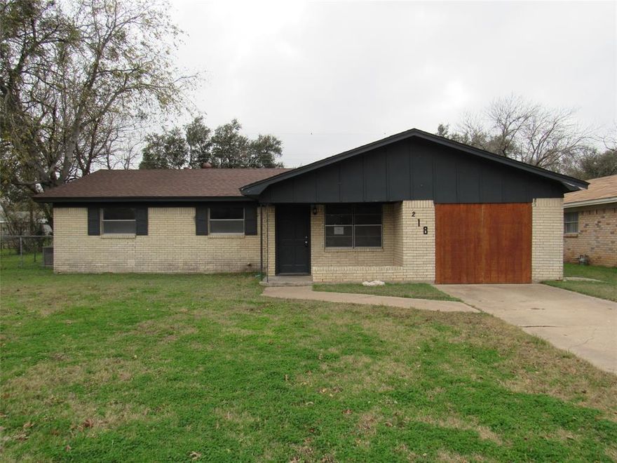 Looking for an affordable home in within a short distance of Texas State Technical College? This home is so close, it might as well be on campus! Welcome to this spacious and inviting 3 bedroom, 2 bath brick ranch nestled on a quiet street! This well-maintained home offers a perfect blend of comfort, convenience, and value. Step inside to find two bright, open living areas with plenty of room to relax or entertain. The kitchen features ample counterspace, solid cabinetry, and a well lit dining area that opens to the backyard. All three bedrooms offer generous closet space, and the primary suite includes a private bath with a tiled shower. Enjoy Texas evenings in your large backyard - perfect for barbecues, pets, or playtime. With its durable brick exterior and a peaceful neighborhood vibe, this home checks all the boxes. Located just minutes from TSTC, schools, shopping and transportation, this home delivers small-town charm with big-time value. Don’t miss your chance to own this gem!