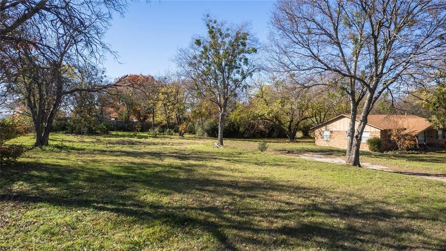 This 0.6-acre (26,129 sqft) residential lot on Main Street offers the perfect blend of location and potential. Cleared and ready for your vision, with public utilities available at the street (buyer to verify service connection). A previous residential structure was removed, making way for new possibilities just steps from restaurants, shops, and the charm of historic downtown Mansfield.

No HOA. Zoned for residential use. The property includes two parcels: 
02175045
Land Sqft*: 5,269
Land Acres*: 0.1209

02175061
Land Sqft*: 20,860
Land Acres*: 0.4788

This property offers potential for rezoning, though it is not guaranteed. Buyers are encouraged to verify all details and pursue the process with the City of Mansfield if desired.