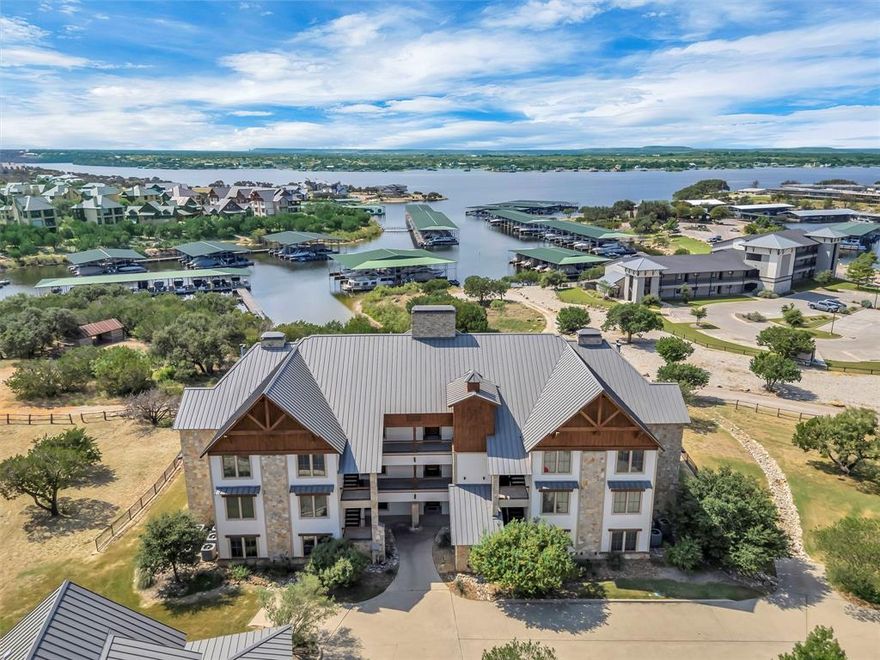 Turn-key, fully furnished condo in the Harbor community at Possum Kingdom Lake. Ground-floor unit with walk-out yard access and wrap-around patio. Inside you will be greeted by an open-concept layout featuring 3 bedrooms, each with a private en suite. Hardwood floors, granite counters, and high end stainless steel appliances!  Enjoy resort-style amenities including pools, fitness center, sports complex, fishing ponds, and lake access. Perfect for a weekend retreat or lock-and-leave living.