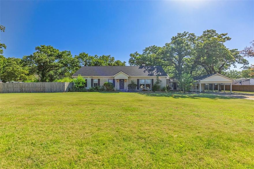 Enjoy the best of both worlds with this unique property situated on a 1.33 Acre lot on the outskirts of town! You will fall in love with the enormous back yard adorned by beautiful mature oak trees! Property features a circle drive, two car carport, and a 20x40 Workshop in back!! Inside you will find a unique spacious floorplan with oversized bedrooms, 2 living areas, 2 dining areas, mud room, and so much more! There are so many ways to utilize the space! BRAND NEW ROOF!