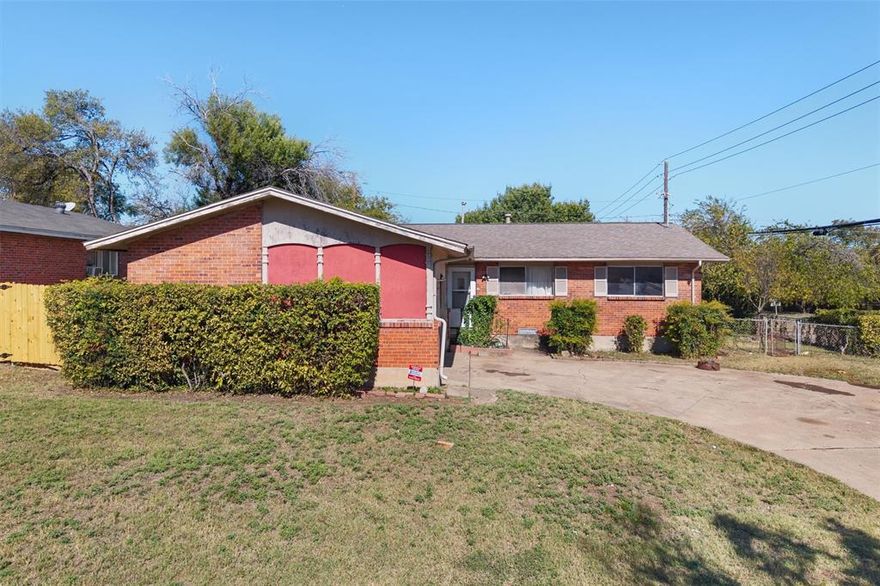 2588 Wood Valley Drive offers a 3-bed, 2-bath layout on a .20 lot in 75211. This property is being sold as is, ready for a buyer to renovate, customize, or build equity through updates. 1,376 square feet provides a functional footprint with main living area connected to kitchen and with large flex or bonus space that could be work room, storage, or made into an office. Located within minutes of Kiest Park, Tom Thumb, and Mountain View College, the home sits less than four miles from Bishop Arts District and downtown Dallas access via I-30 or Loop 12. Nearby transit at Westmoreland Station (1.8 mi) adds commuter options while local parks and schools are just a short drive away. With a spacious lot and established trees in a residential pocket, the setting and property has great potential. Drain lines have been replaced, there is a recently installed electrical panel, the HVAC has been updated, and the separate workshop has full power.  Ideal for an investor, DIY buyer, or anyone looking for a project property inside city limits with convenient proximity to Oak Cliff’s growing amenities. NO SIGHT UNSEEN OFFERS.
