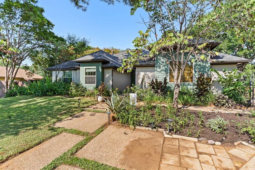 Gem in the Wild!
Updated stunner situated in a beautiful, quiet neighborhood in Grapevine Colleyville ISD! Expansive lot on a peninsula, walking distance to Lake Grapevine and expansive walking trails. 
Remodeled from the ground up and boasting upgraded finishes inside and out. Luxury vinyl plank flooring throughout. New Custom cabinets in the chef's kitchen featuring stainless-steel appliances, massive island, high end Quartzite counter tops and a ton of storage. The luxury light fixtures in addition to fresh paint inside and out and new windows in front of home make it feel like a new build.
Inviting open floor plan perfect for entertaining. Huge living area and several nooks to create your own space. Master bath remodel includes more custom cabinets, Walk-in shower, Dual vanities, and newly configured closet.  A brand new half bath was added without increasing the home's footprint.  Step out back into the screened-in patio and enjoy your serene, large backyard with beautiful swimming pool, majestic trees and large storage shed.
Eligible for Carroll ISD open enrollment