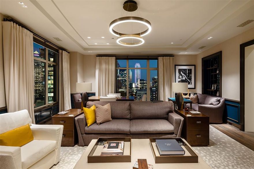 This one-of-a-kind, 2,154 sf high-rise “Pied a Terre” residence was custom designed & finished by acclaimed interior designer Joan Behnke & features only the finest quality finishes. The custom floor plan features a spacious living room & covered terrace with views of downtown Dallas, & a private study. The primary suite has a spa-like master bath with Gessi fixtures & custom walk-in closet. The kitchen features Dorn Bracht fixtures & custom cabinetry with SubZero& Wolf appliances & pot filler. It adjoins a breakfast area with custom built-in banquette. The home also has a custom Crestron lighting & audio system & custom hardware & electronic window shades that all convey with the residence.