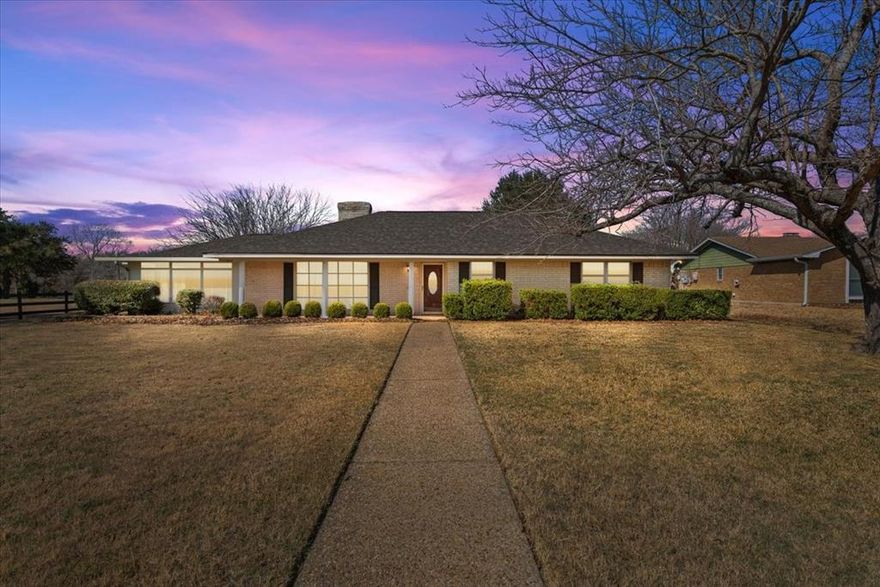 Charming 3 bedroom, 2 bath home next to the Lake Waco Golf Club.  Discover this beautifully maintained home designed for comfort and relaxation that is perfectly situated on a spacious lot. Enter the living area with soaring ceiling and cozy fireplace for those special times  to enjoy family and friends. The heart of this home features a well-appointed kitchen, ideal for culinary enthusiasts with ample counter space.  The sunroom provides  a place to relax and soak in the natural light.  Take a quick walk or ride over to tee off or enjoy a delicious meal at the restaurant.  Homes like this are rare, with its exceptional features and prime location. Seize the opportunity to make this gem your own.