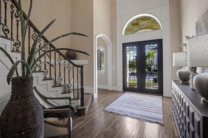 PRICE ADJUSTMENT on this stunning custom-built property situated on a spacious lot in the desired Carillon community.  As you step inside, you’re greeted by an open concept floor plan that seamlessly flows, connecting the gourmet kitchen with the eating area and family room; providing a great space for entertaining and relaxation.  A game room and guest suite down add to the home's livability. The beautiful finishes throughout include rich hardwoods, neutral tones, designer lighting, custom cabinetry, and plantation shutters, just to name a few. The landscaped back yard with covered patio, outdoor kitchen and roll down screens is a great area for play, grilling and entertaining.  End the day in the serenity of your luxurious master suite complete with a spacious sitting area and beautifully appointed ensuite bath. With its amazing location in Southlake, with excellent access to highways, the DFW airport, shopping and restaurants, this home is the epitome of luxury living - A MUST SEE!