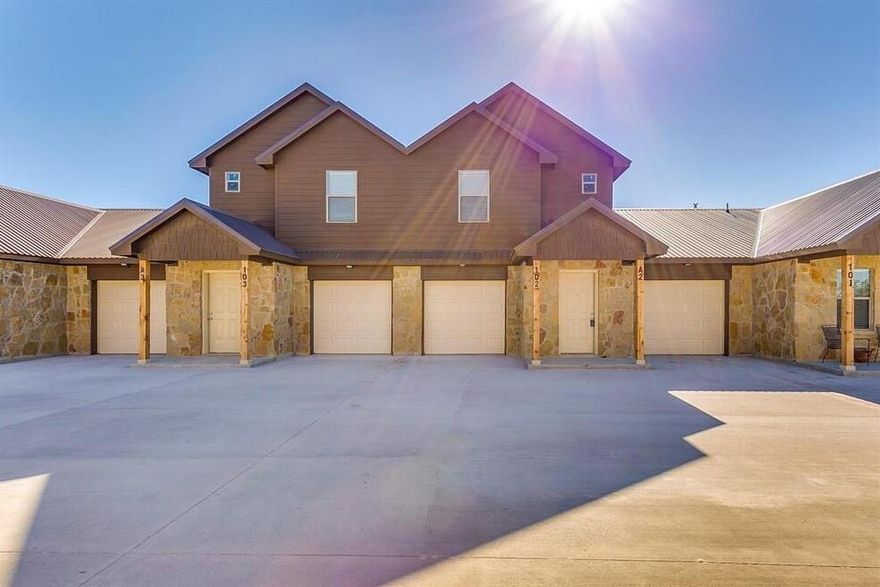 MOVE IN SPECIAL: Half off 1st month's rent when you move in by January 1st! 3 bedroom townhome for lease. Refrigerator included. Granite countertops, hardwood flooring throughout. The complex consists of 3 buildings with 4 units each, offering a cozy community feel. Attached 1 car garage, walk in closet in the primary bedroom, in-unit laundry hookups. Don't miss the opportunity to lease this beautiful townhome and experience comfortable and modern living in Weatherford, Texas. Brock ISD. Trash, sewer, and water included.