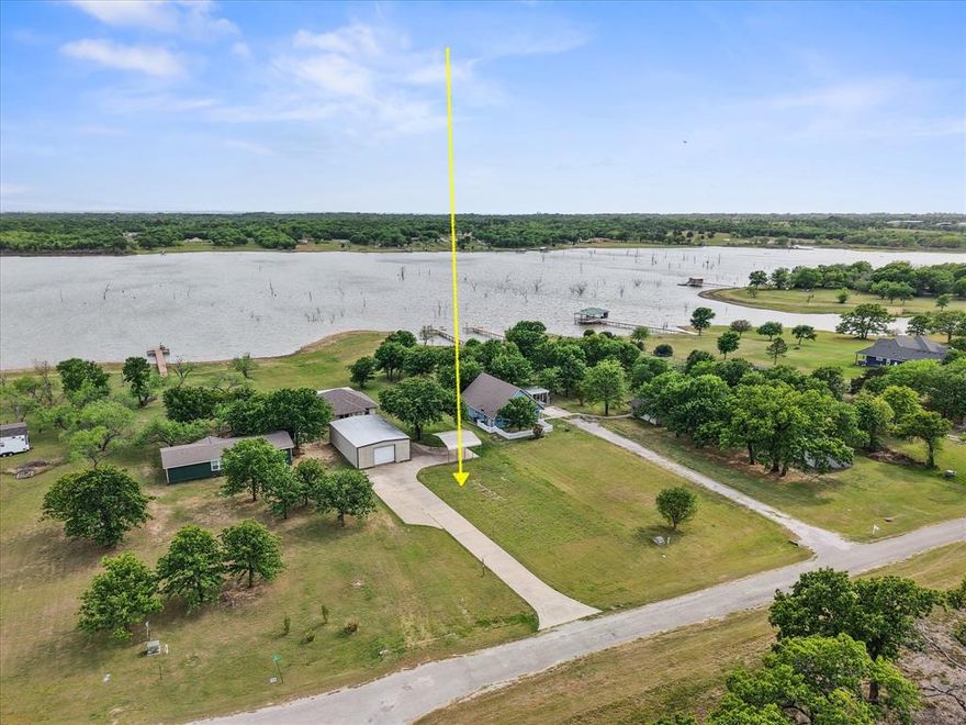 Welcome to your turnkey lakefront escape on Richland Chambers Lake—where laid-back lake life meets built-in income potential. Situated on approximately 0.9 acres with no HOA, this property offers the freedom to enjoy your space your way, whether you’re looking for a weekend retreat, full-time living, or a proven short-term rental investment.
The 1,459 square foot home features 3 bedrooms and 2 bathrooms, designed for comfort and easy living. Step outside and you’ll quickly see what makes this property special—a massive screened-in patio complete with a hot tub, perfect for relaxing after a day on the water, plus a dedicated fire pit conversation area made for sunset evenings and gathering with friends and family.
With approximately 134 feet of dockable shoreline, you’ll have direct access to the open waters of Richland Chambers Lake, giving you endless opportunities for boating, fishing, and soaking in those wide Texas sunsets.
Need space for hobbies, storage, or projects? The impressive 1,500 square foot workshop with 2 roll-up doors, plus small storage room with AC has you covered, along with a convenient 2-car carport for additional parking.
This home has been a busy short-term rental, offering immediate income potential when you’re not enjoying it yourself. Even better—it comes fully furnished with all appliances and is completely stocked, making it truly move-in ready or rental-ready from day one. Just bring your clothes and groceries, or start generating income right away.
Lake life, investment opportunity, and turnkey convenience—all wrapped into one incredible waterfront property.