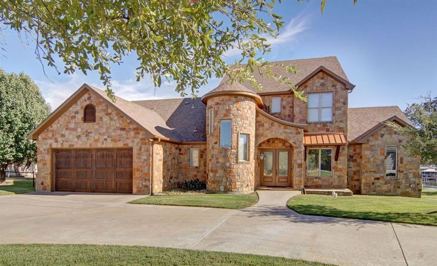 Waterfont home in the gated Gaines Bend community on Possum Kingdom Lake. Turn Key property, ready to enjoy. 2 Master Suites,2 living areas with space for entertaining.  Upgrades throughout the home. Breakfast bar & island await the Chef in the family. Gazebo with stone fireplace & BBQ for entertaining. Open floor plan for large group family time. Covered patio & upper balcony with expansive lake views. Seperate washer & dryer room with storage. Double oversized garage with entry to the main level. 2nd floor living area for kids space or quiet getaway. Grassed rear yard all the way to the waters edge. Floating dock with sundeck & covered entertainment area at water level. Boat & Jet Ski lifts built in the dock & storage for the lake toys.  Key coded security entry to the resort with security cameras. Dock has big lake views while being protected from wind & wave action. Low maintance dock trex flooring. Easy access to the main lake. Facilities & roadways maintained by the HOA.