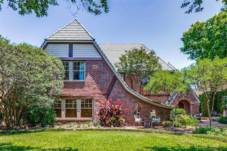 Incredible opportunity rarely seen – a Vintage Place home on the market! This cul de sac subdivision built by Jeff Fairey is a well-kept secret. Built in 2004, this English Tudor style home boasts red brick and green imported 75-year life ''Ludowici'' tile roof! Five bedrooms, four and a half baths, two incredible and spacious living areas plus outside living areas as well. The owner-designer has enhanced the living areas with seamless updates.
Chef's kitchen opens to a spacious breakfast room and main living room - all with views of pool, patio, and yard. A downstairs guest suite also opens to the patio. Upstairs offers privacy with a master suite, three bedrooms and a large family room. With a children’s playground just across the street, plus all that Lakewood has to offer, this is a great home in Dallas’ best neighborhood.