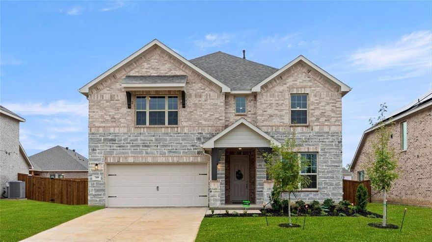 MLS# 20387733 - Built by HistoryMaker Homes - Ready Now! ~ This two story home has great curb appeal with all brick and stone, professionally designed & has many wonderful upgrades. On a large 65 foot lot with a side entry garage. The bedrooms are good sizes.  You will appreciate the continuous wood look tile flooring in all the main areas. The kitchen is a chefs dream with gas cooktop, upgraded cabinets, upgraded backsplash, granite countertops, & sink in the large island. The master is large & the bathroom has a generous closet, soaker garden tub & large shower. The tankless water heater has many benefits and it gives you more space in your garage. Full sprinkler & sod.