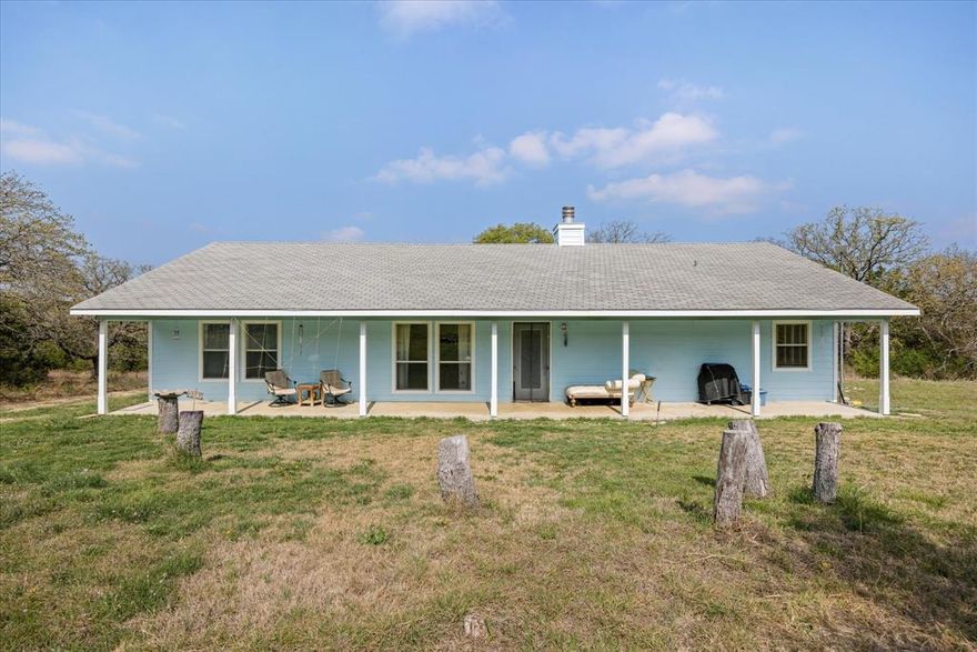 20-acre secluded property tucked away off the beaten path. Well-built custom 2 Bed 2 Bath Home with a pass-thru fireplace into the Master Suite, a super-sized soaking tub for relaxing after a long day. Split bedroom, huge Laundry area with a pet wash station. So many cool features for the country lifestyle. Did I mention, 20 acres with lots of privacy & No-known Restrictions giving you the freedom to truly make this property your own. Whether you're looking to hunt, ride ATVs, explore the outdoors, or simply enjoy the peace and quiet, this property delivers the ultimate country lifestyle. Get out of the City & enjoy quiet peaceful nature. Great for your residence or a weekend get away. Just a short hop into Hico to shop & enjoy all the annual festivities. Don’t miss this one.