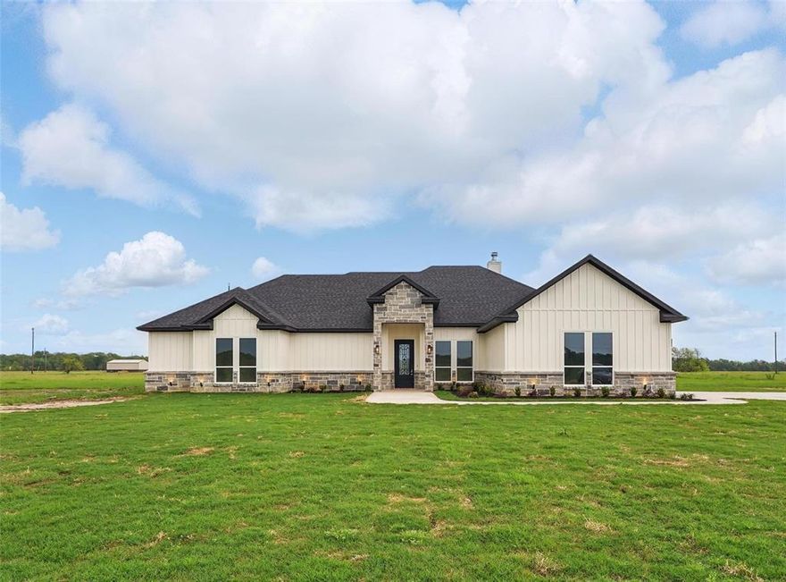 NEW LUXURY CONSTRUCTION + ACREAGE + MILDRED ISD -
Experience refined lake-area living in this luxury home where elegance, comfort, and modern design come together. Sitting on 2 acres in the prestigious Shores on Richland Chambers community, this property offers a combination of upscale finishes, functional design, and serene surroundings. Features 5 bedrooms, 3 full baths, fully walk-in entry study ideal for a 5th bedroom, home office or flex space. The open-concept layout is filled with natural window light, custom accent walls, creating a sophisticated and inviting atmosphere.
The impressive gourmet kitchen offers abundant cabinetry, large island with built-in features, and ample counter space for cooking, gathering, and entertaining. The kitchen flows effortlessly into the living area, with both spaces overlooking the backyard.
The primary suite offers a relaxing retreat with a spa-inspired ensuite bathroom, freestanding soaking tub, oversized walk-in shower, dual vanities and a luxury custom dual walk-in closet which conveniently connects to the utility room. 
Secondary bedrooms are generously sized, Baths including a Jack and Jill feature quality finishes that reflect the home’s elevated design. Every detail was carefully design to balance style and functionality. Elegant covered back patio, perfect for relaxing evenings or hosting guests while enjoying breathtaking sunset views. With over 2 acres, the property provides ample space for recreation, entertaining, or future enhancements such as a pool, outdoor kitchen, or shop.Additional highlights include foundation piers for added structural integrity, foam insulation for enhanced energy efficiency, a full irrigation system, and gutters throughout. Residents of The Shores on Richland Chambers enjoy access to amenities including a private boat ramp and dock, clubhouse, and direct access to Richland Chambers Reservoir offering endless opportunities for boating, fishing, and lakeside relaxation.