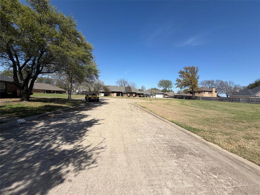 Beautiful Lot at end of the cul de sac on Heatherstone Circle in Wellington Park subdivision, Kaufman, Texas.  17,602 square feet, .40 of an acre.

There is another lot across the street with 15K+ square feet, .37 of an acre also.