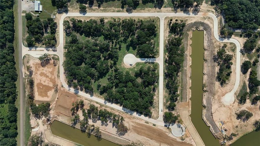 Welcome to Emerald Bay at Cedar Creek Lake! Where luxury meets natural serenity, a remarkable community featuring only 71 exclusive homesites meticulously crafted across 44 stunning acres. Here, you can choose from both waterfront and interior homesite options, making it your chance to call this exceptional subdivision home—just over 1 hour east of downtown Dallas. Immerse yourself in a naturally inspired lake lifestyle at Emerald Bay, where your amenities embody the perfect intersection of nature and luxury. Life at Emerald Bay revolves around the refreshing waters of Cedar Creek Lake. LOT #51 IS A INTERIOR LOT. SHARED MARINA BOAT SLIP FOR PURCHASE. INQUIRE ABOUT SELLERS CONCESSION!

Amenities at Emerald Bay:
- Stunning Swimming Pool: Designed for leisure, the pool is perfect for swimming laps or lounging poolside, offering a peaceful retreat.
- Pickleball Courts: Stay active on our state-of-the-art pickleball courts.
- Basketball Courts: Shooting hoops at our well-maintained courts.
- Playground: Designed for family fun and adventure. 
- Fire Pit: Enjoy cozy evenings around the fire pit, perfect for cooler nights while surrounded by the beauty of nature.
- Golf Cart Trails: Scenic golf cart paths throughout Emerald Bay, to navigate the community and connect with neighbors. 

This gated community boasts concrete roads, curb and gutter, underground utilities, street lighting, private water, private sewer, and fiber optic connections. With deed restrictions and architectural guidelines for builders, Emerald Bay is a roadmap to a luxurious lifestyle, offering both elegance and comfort. Emerald Bay is not only a stunning community but also conveniently located just a 10-minute drive away from the prestigious Pinnacle Golf Club. This 18-hole championship golf course has been voted the 8th best in Texas, making it a premier destination for golf enthusiasts.  
Being so close to Pinnacle Golf Club adds an exceptional layer to the Emerald Bay lifestyle.