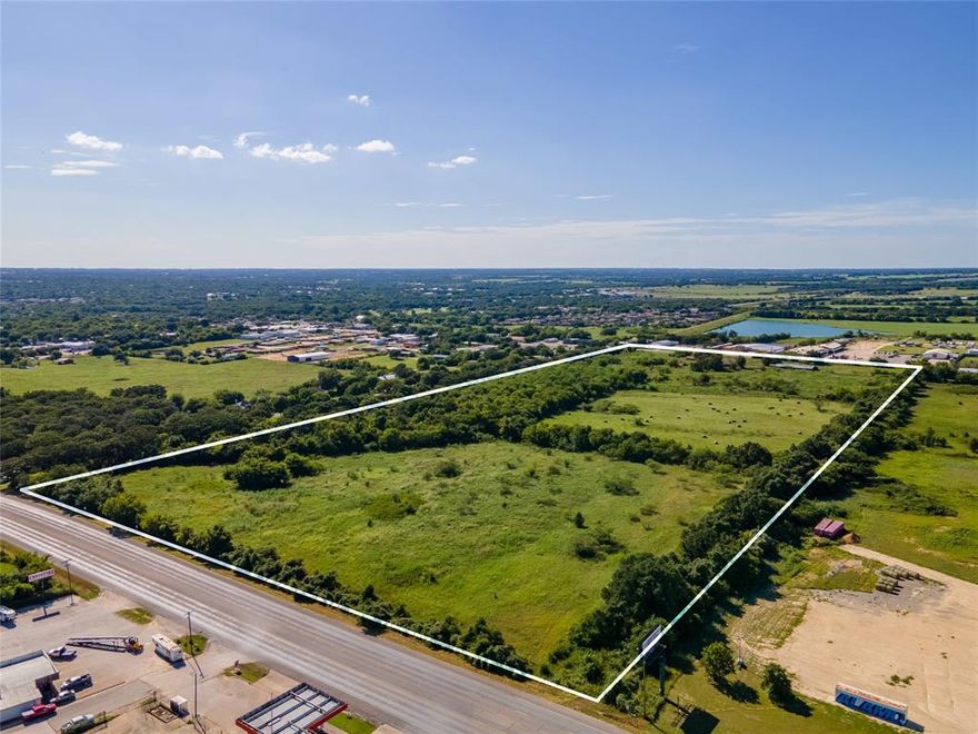 40+- Acres on Business 377 with access to US Hwy 377 South Loop.  Approximately 1 mile to US Hwy 281 intersection.  Excellent property for an industrial complex, multiple housing development or many other commercial uses. City water is available and city sewer is nearby.  Rock farm house on property needs TLC, water well, old barns and storm shelter. This property has fencing with some cross fence in place.
This property is on the outside edge of the city limits and is in the ETJ.
